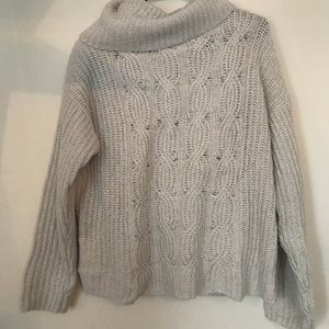 Knit turtle neck sweater.